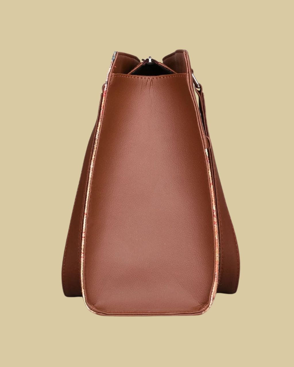 Brown leather handbag on a beige background