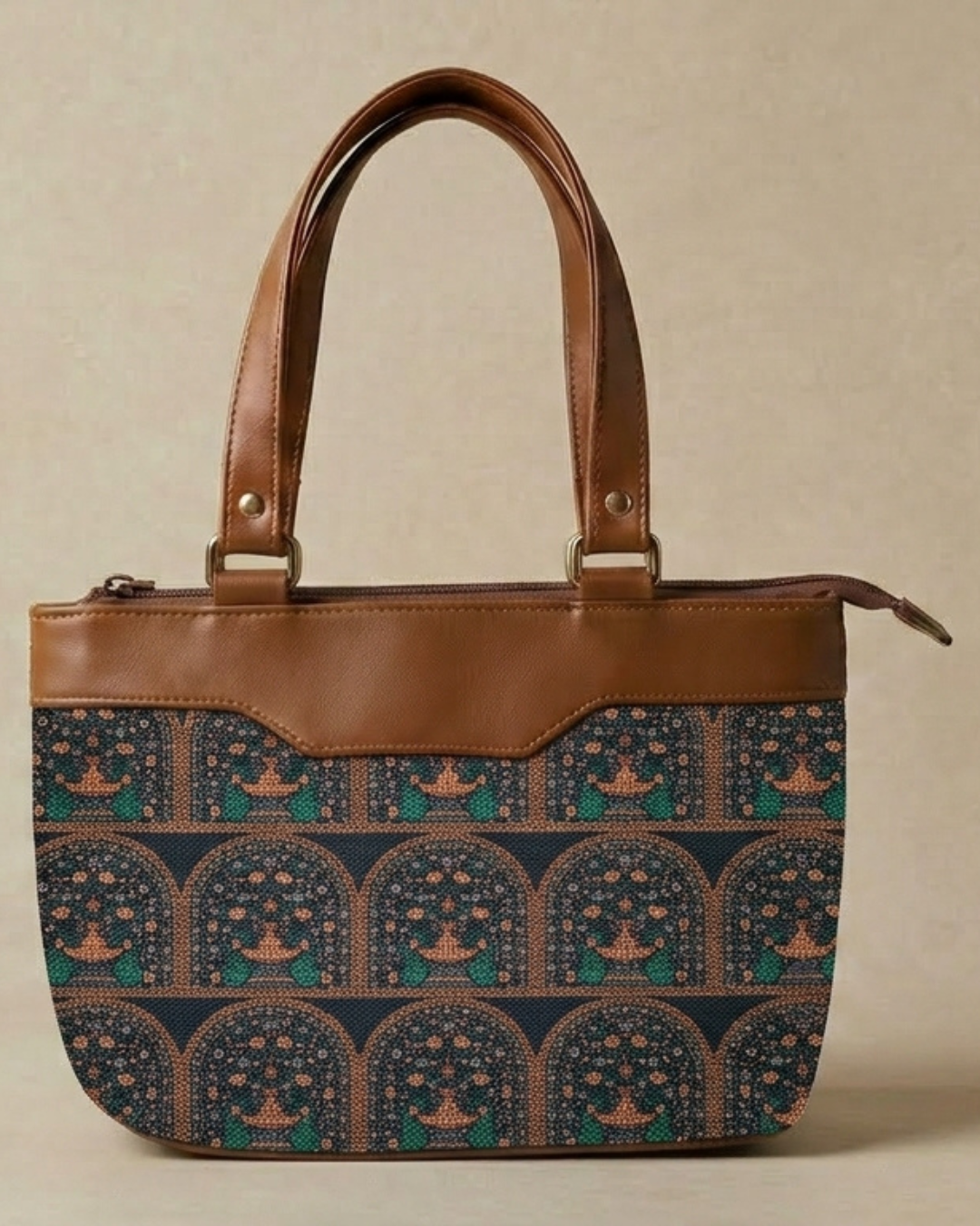 Handbag with patterned top half and plain brown bottom half on a beige background