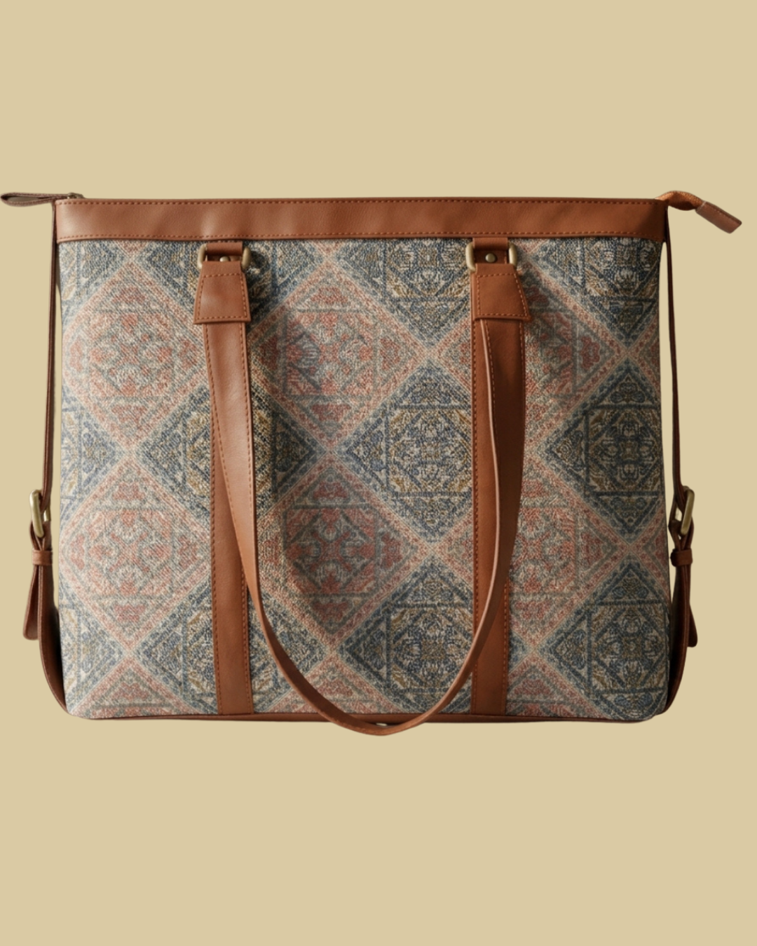Patterned bag with brown straps on a beige background
