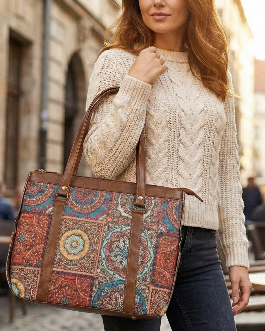 Woman holding a patterned tote bag in an urban setting