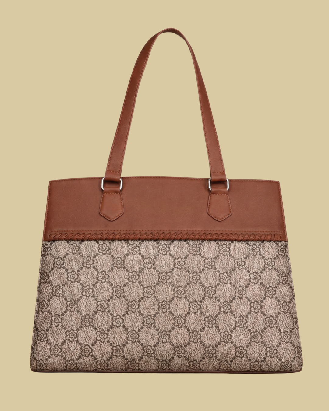 Brown handbag with patterned flap on a beige background