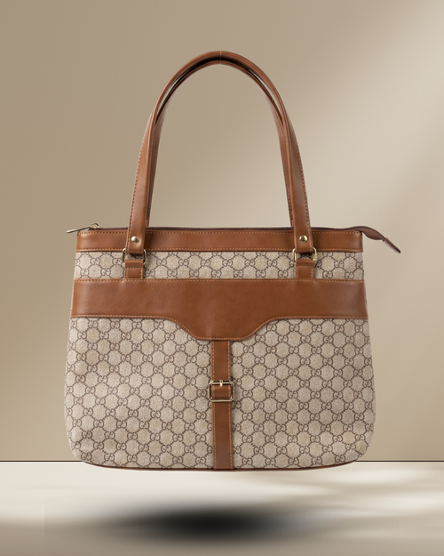 Brown and beige handbag with a patterned design on a neutral background