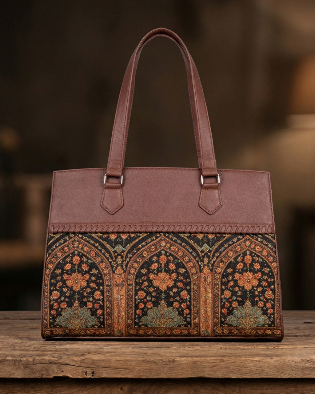 Purple handbag with intricate floral and arch design on a wooden surface