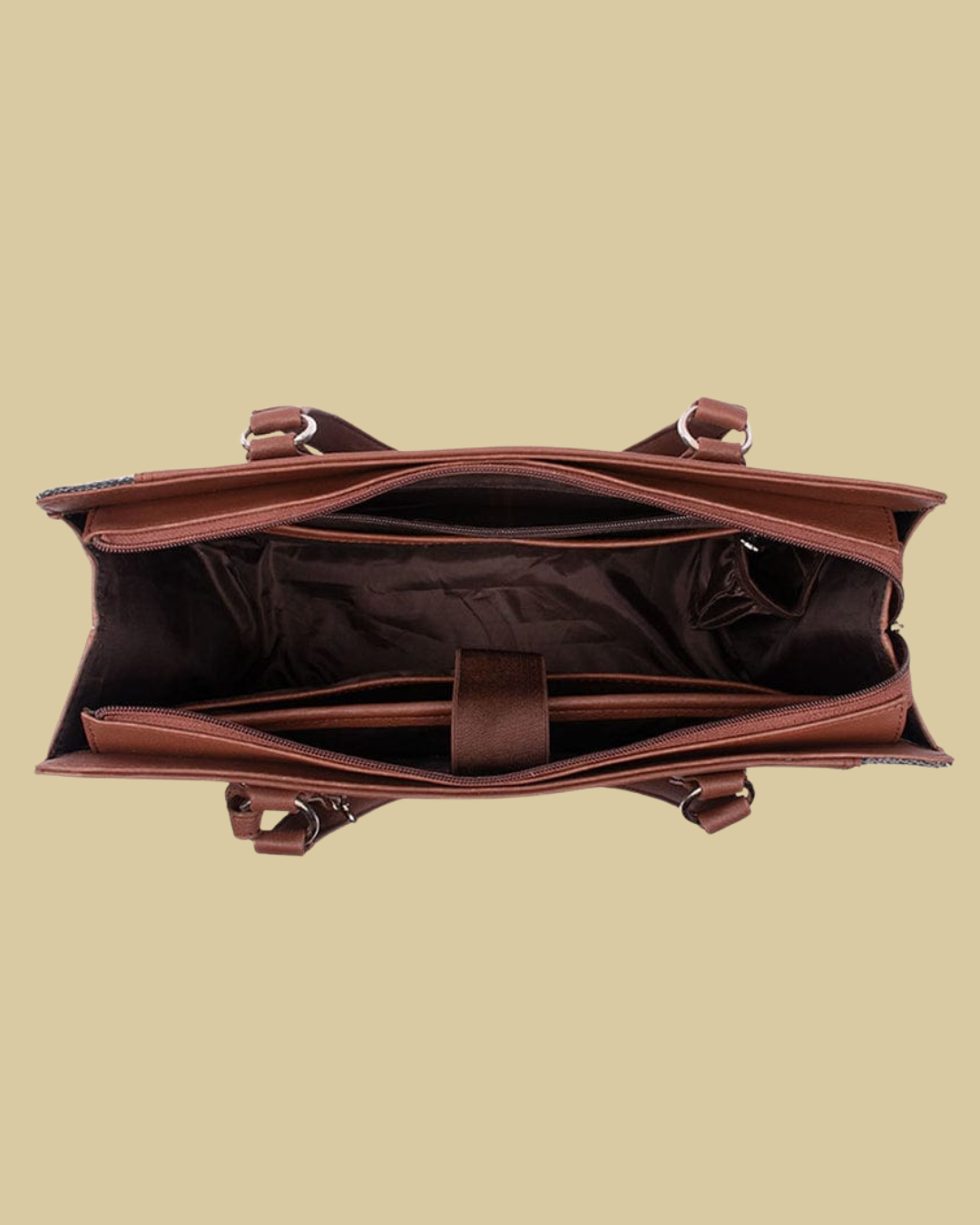 Brown leather bag on a beige background