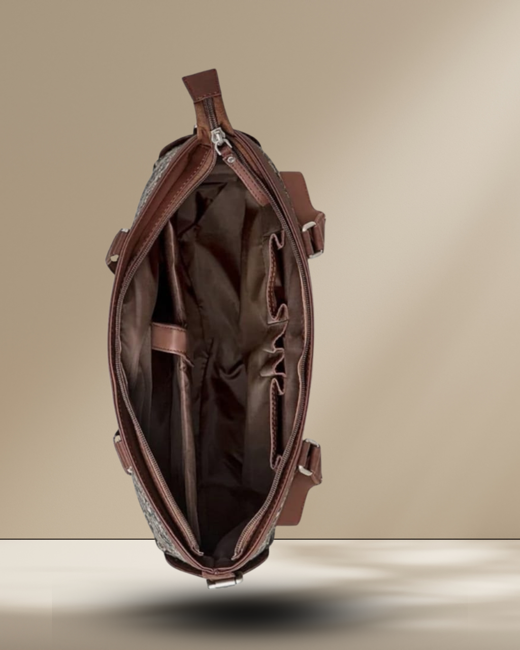Brown leather bag with a beige background