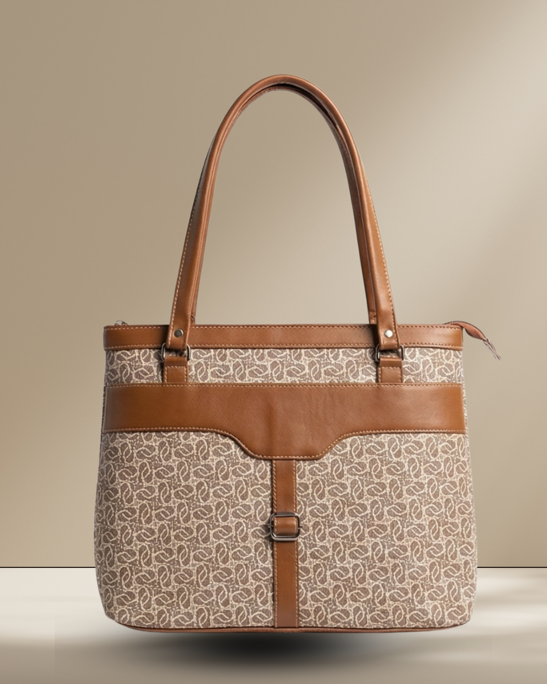Handbag with patterned body and brown leather straps on a beige background