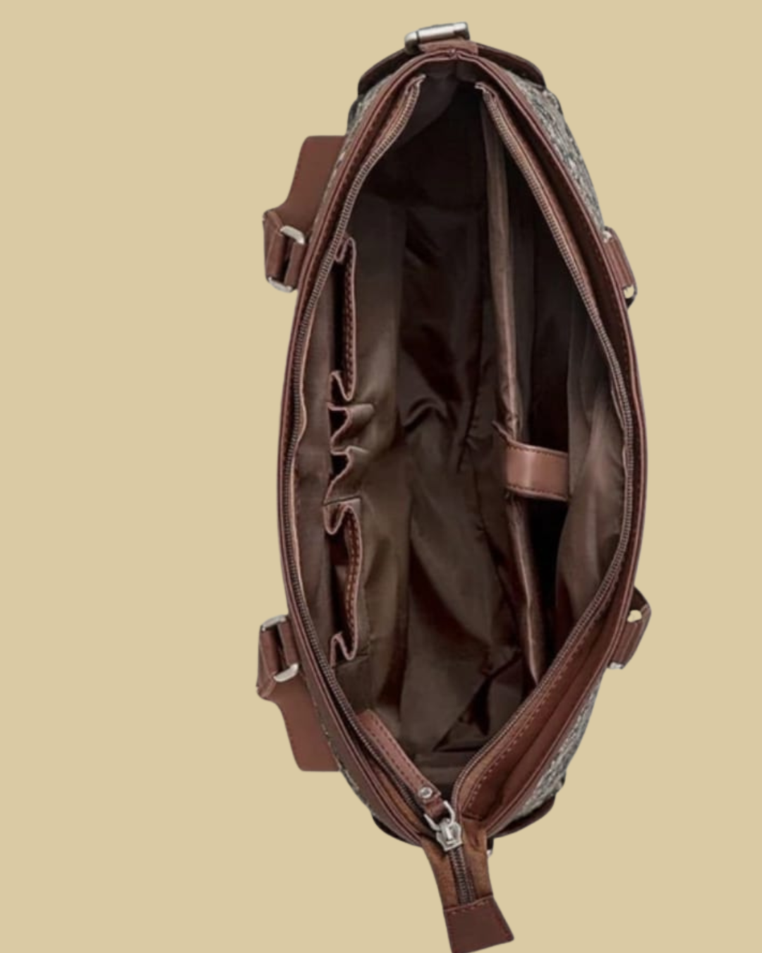 Brown leather bag with a beige background
