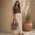 HandyJute Beige and Black Floral Print Tote Bag with Brown Handles for Women