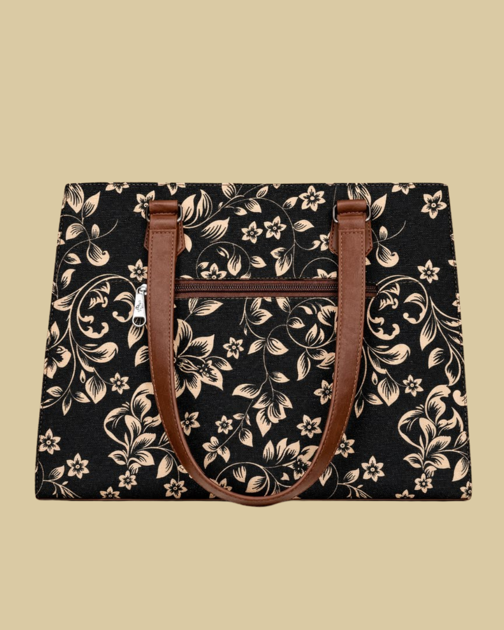 Floral-patterned bag with brown handles on a beige background