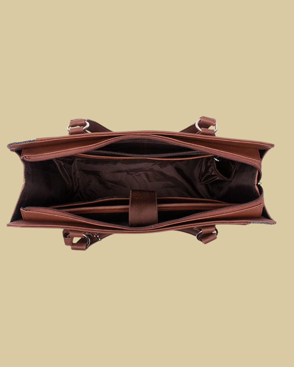Brown leather bag on a beige background
