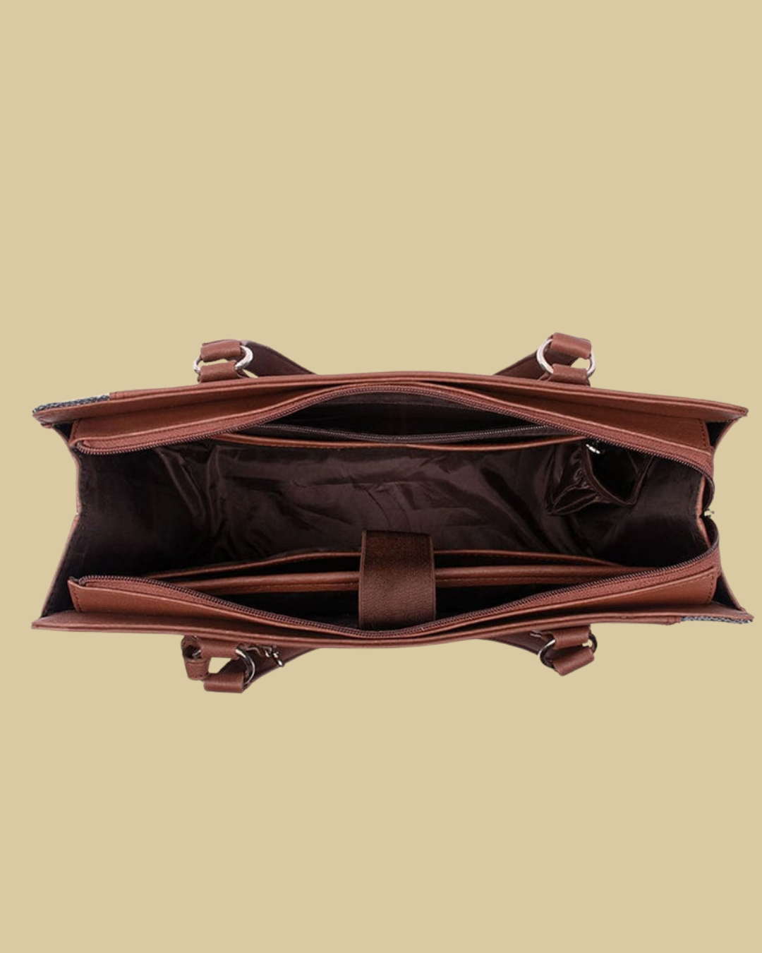 Brown leather bag on a beige background