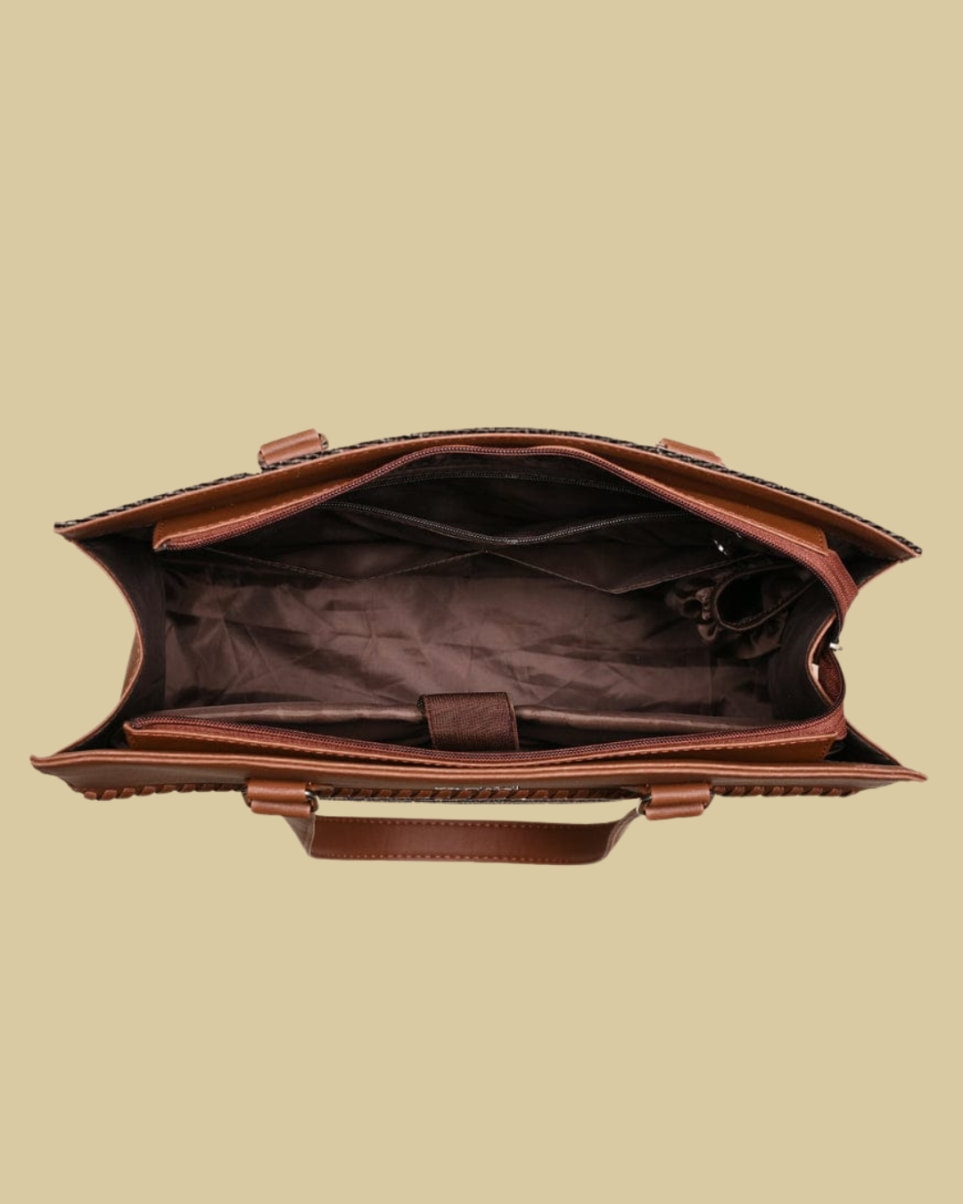 Brown leather briefcase on a beige background