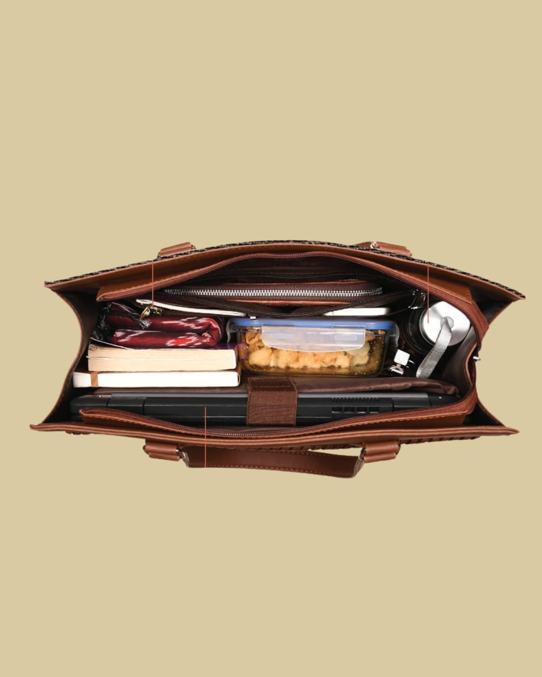Open brown leather briefcase with compartments on a beige background