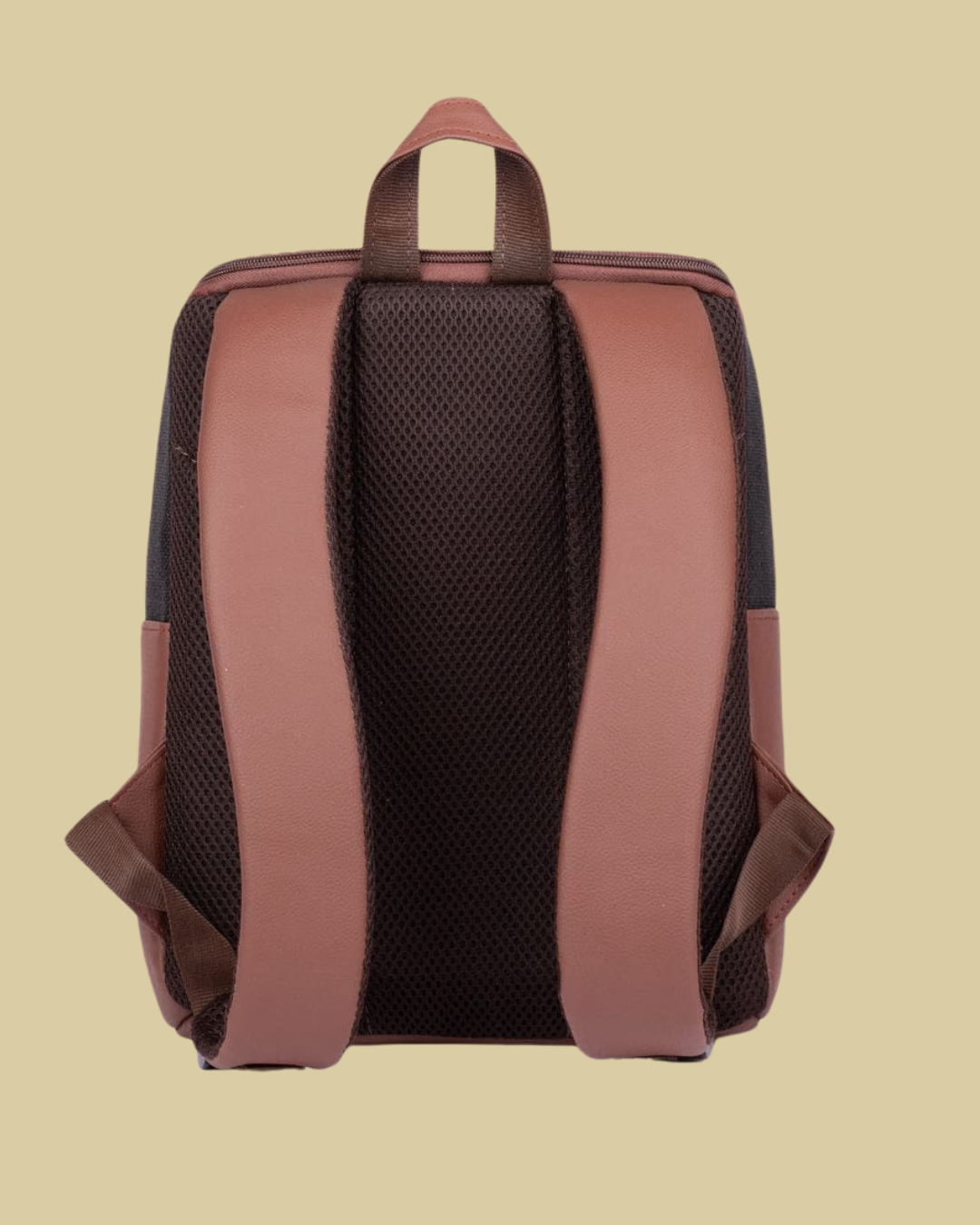 Backpack with brown straps on a beige background