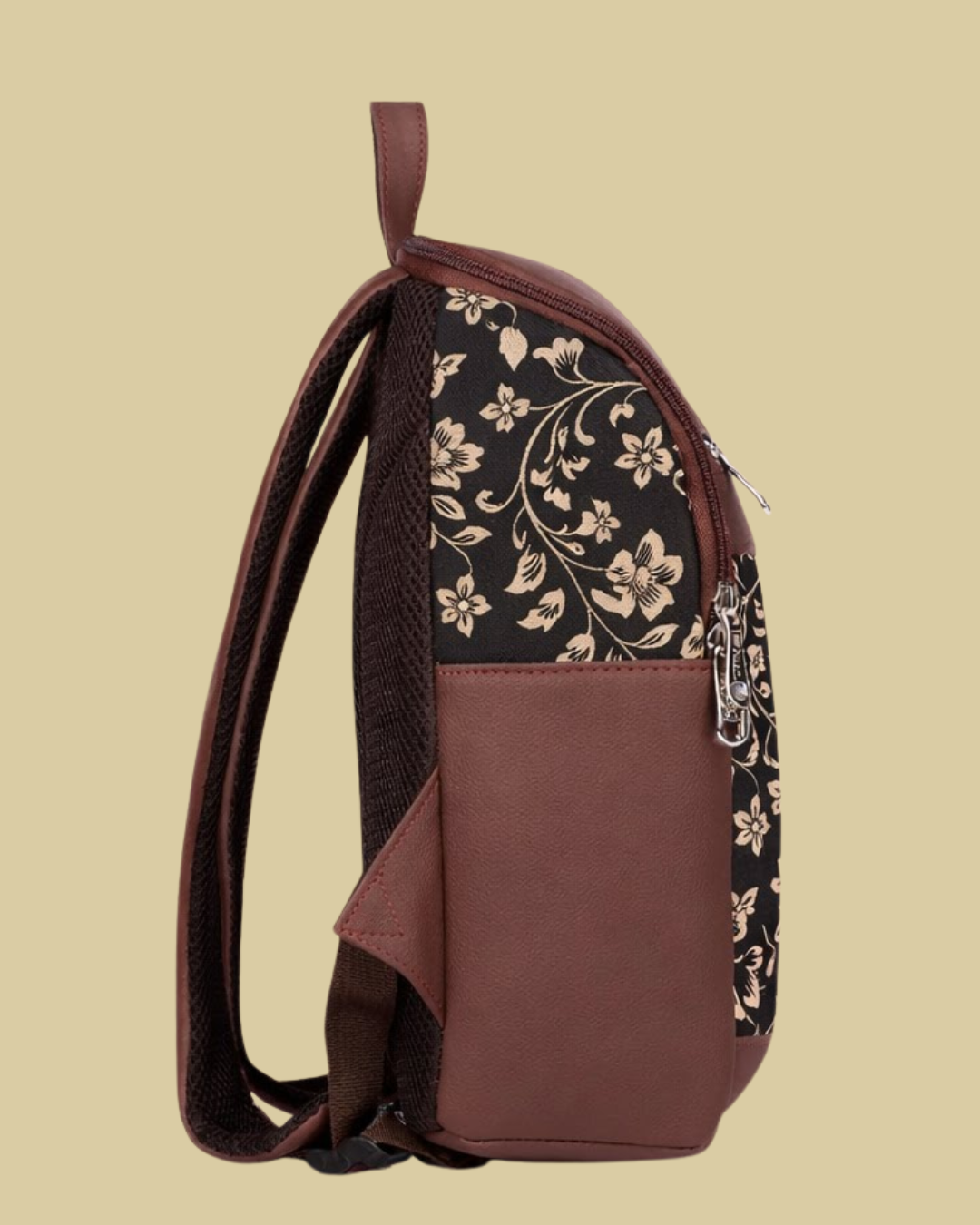 Brown backpack with floral pattern on a beige background