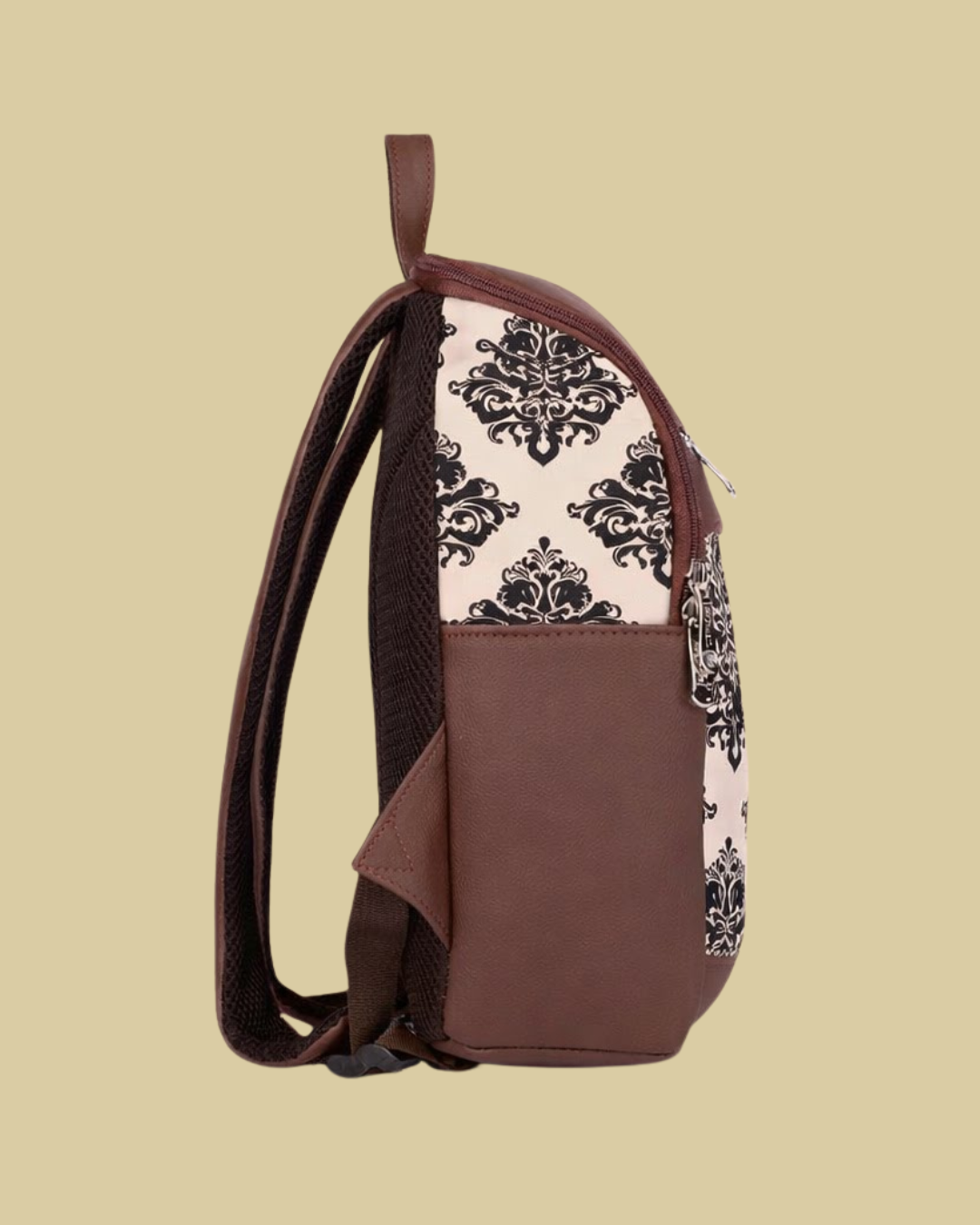 Brown backpack with decorative interior on a beige background