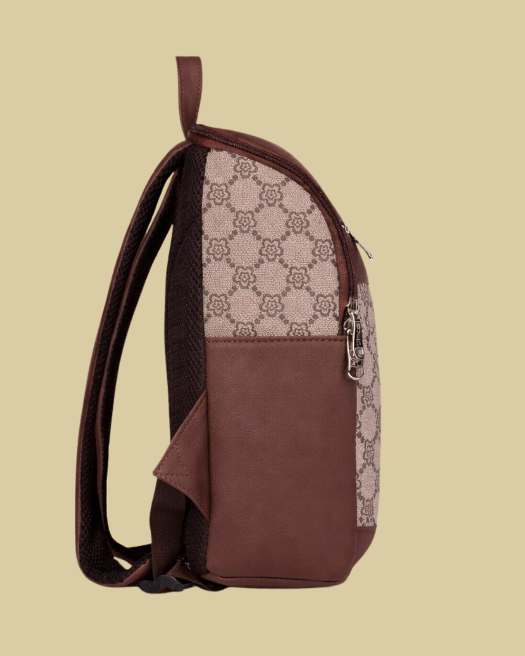 Brown backpack with patterned side panel on a beige background
